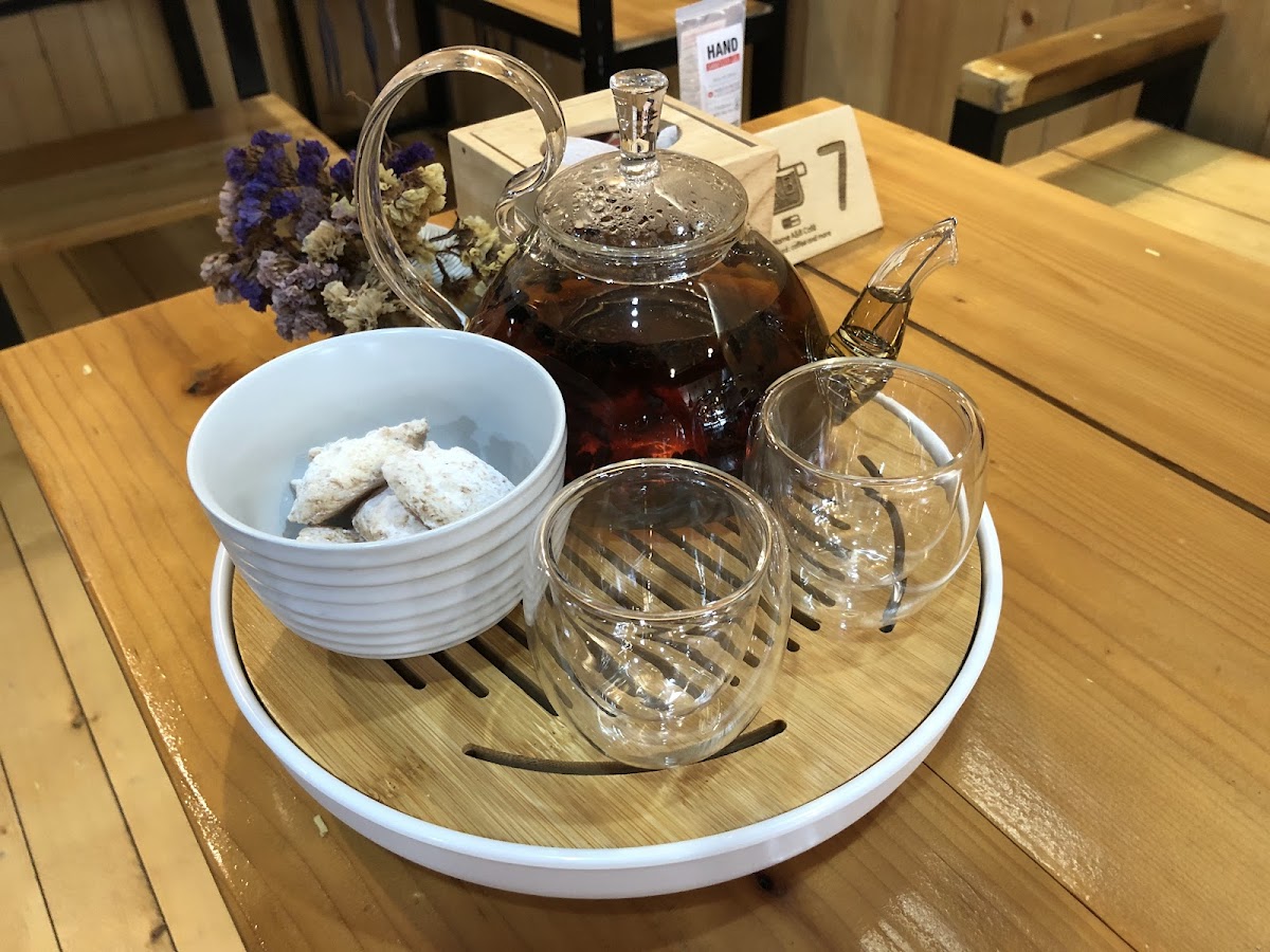 Tea service on wooden table